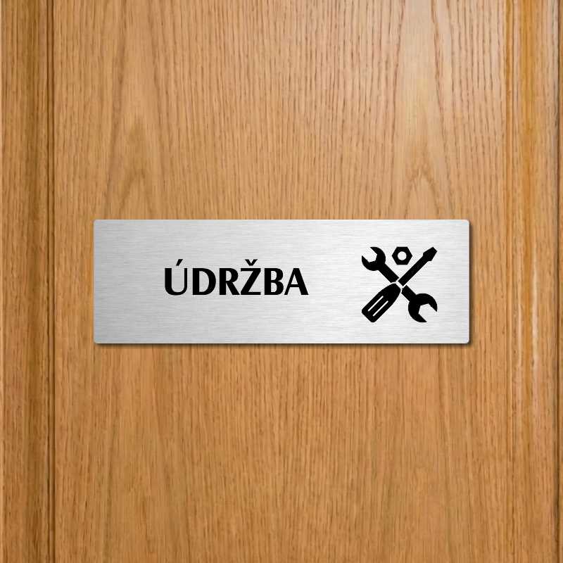Údržba, 240x79mm, zlatá popiska s ozdobou uprostřed